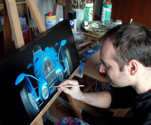 Andrea Del Pesco in his studio painting a bugatti
